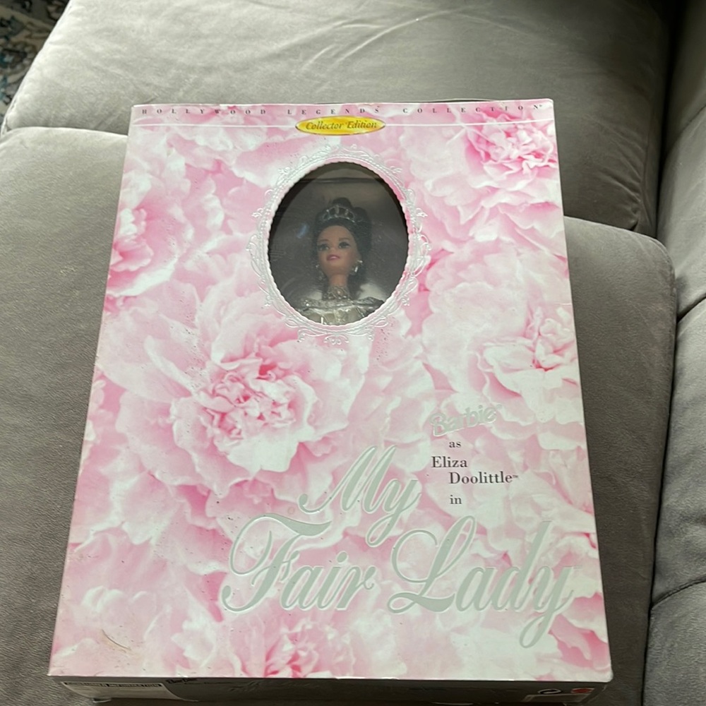 Never opened mint condition my fair lady Barbie from embassy ball 1995